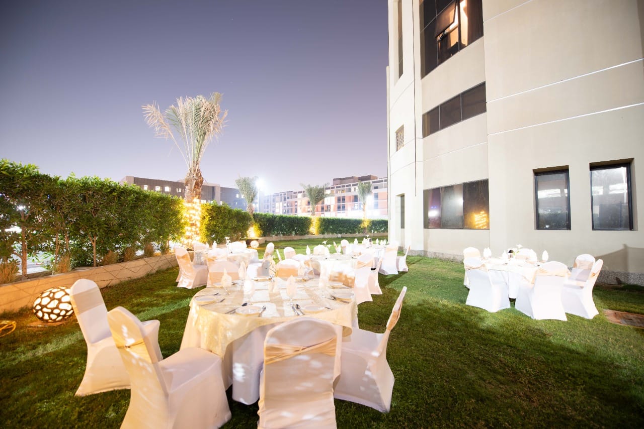 Outdoor garden celebration venue at Gul Café, Dubai Investment Park