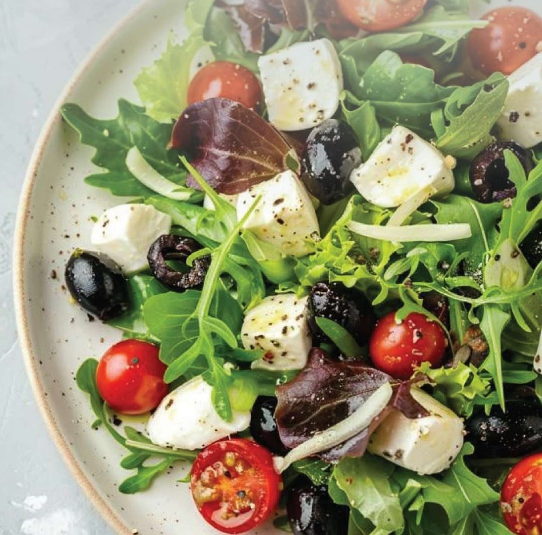 Fresh salad with feta, olives and cherry tomatoes at Gul Café, Dubai Investment Park